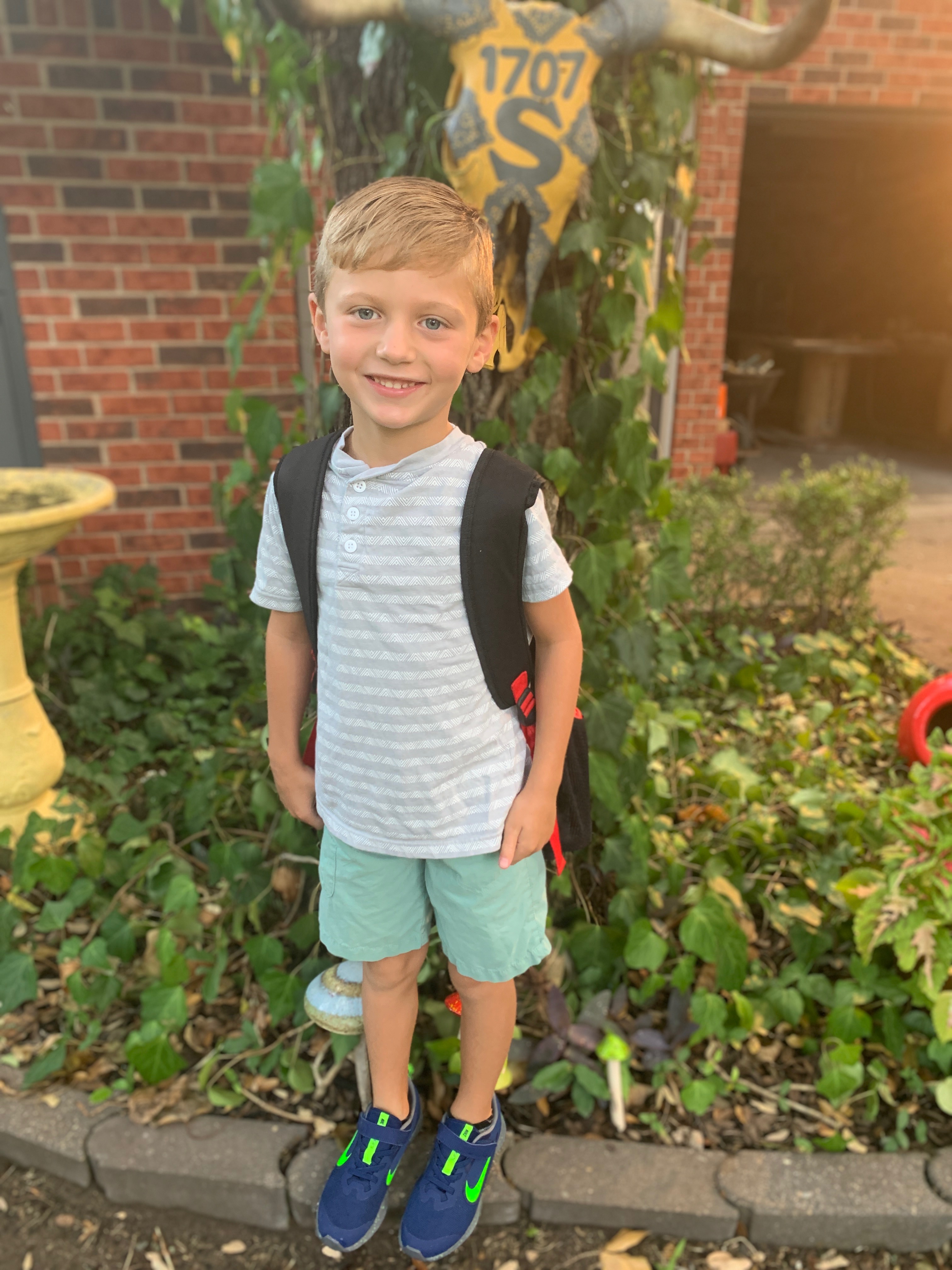 Photo of a student heading back to school (Photo credit: Spectrum News )